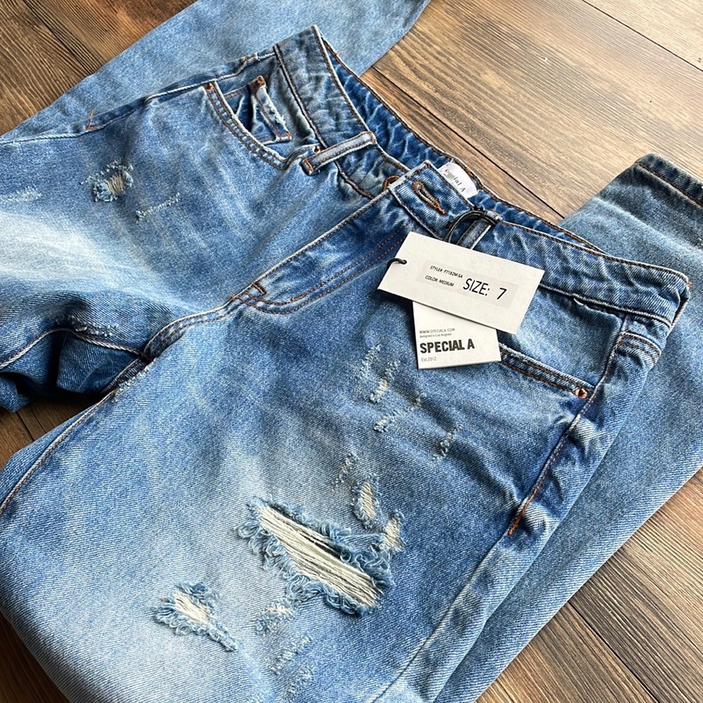 Special A straight leg jeans. Medium wash with distressing. Size 7.